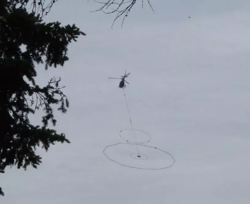 Seen Over The Sault, Helicopter Dragging Something