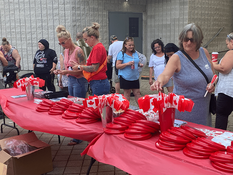 Free buttons, pennants and frisbees were popular items