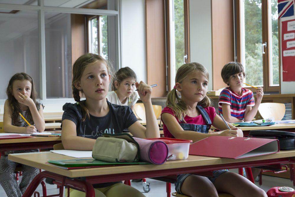 Attentive pupils at classroom