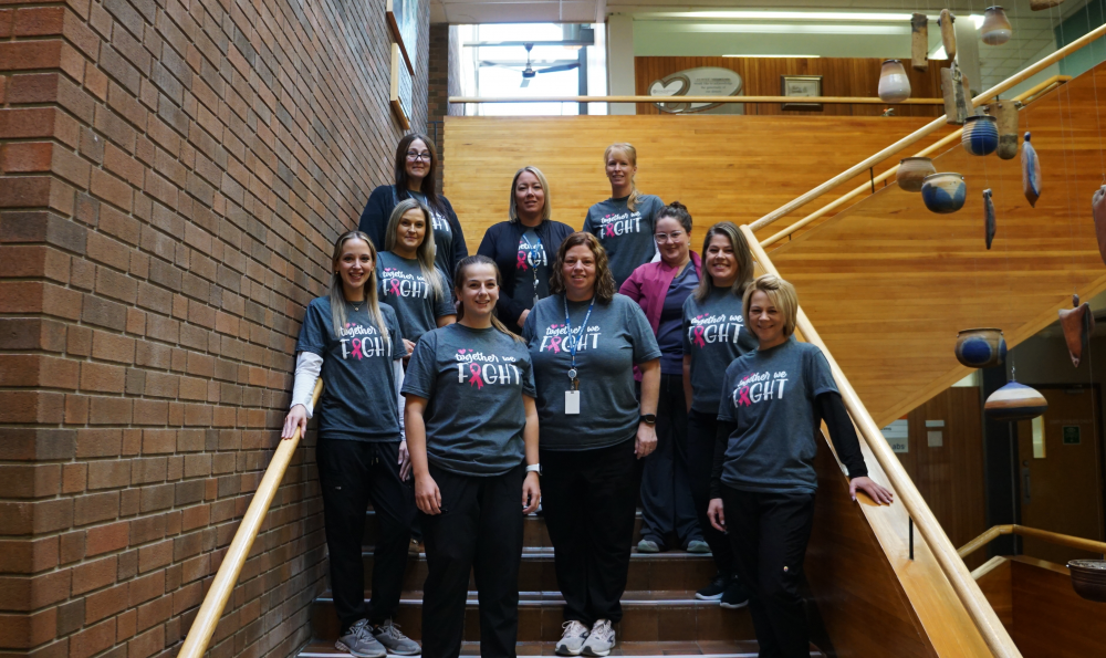 Group Health Centre’s Diagnostic Imaging Team stands together in the fight against breast cancer.